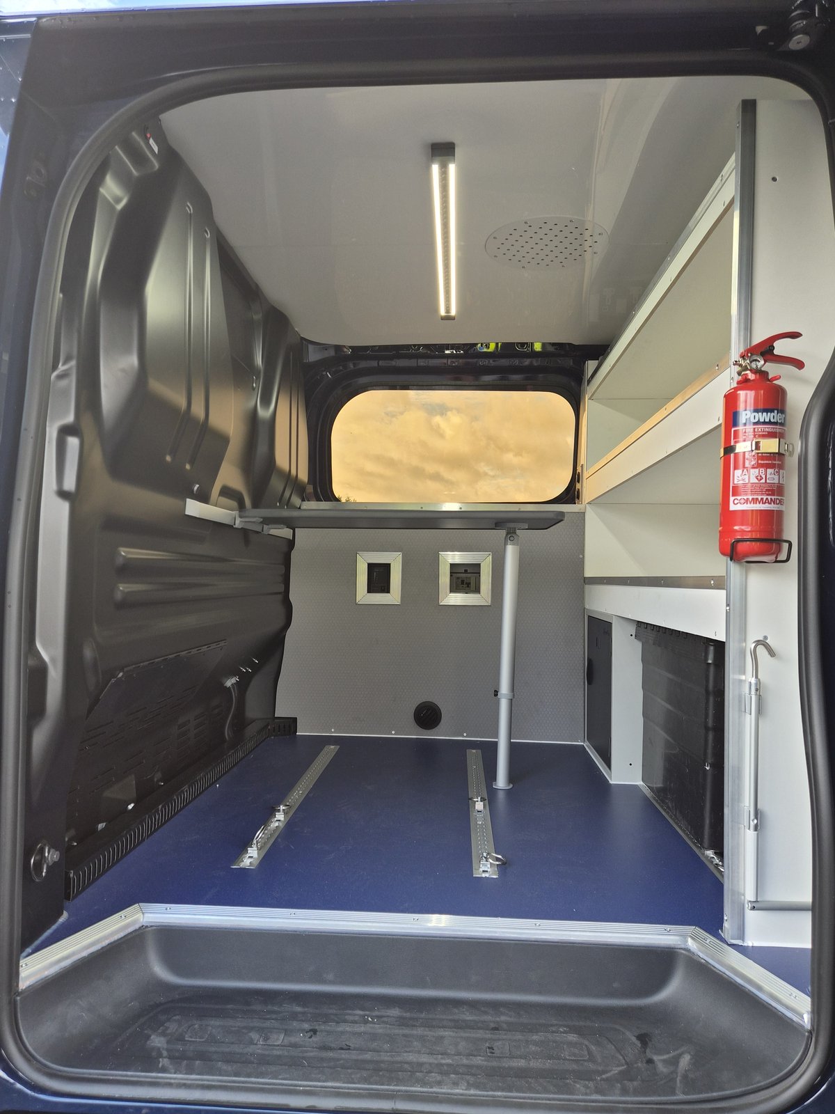 Police Examiner van interior, rear doors open