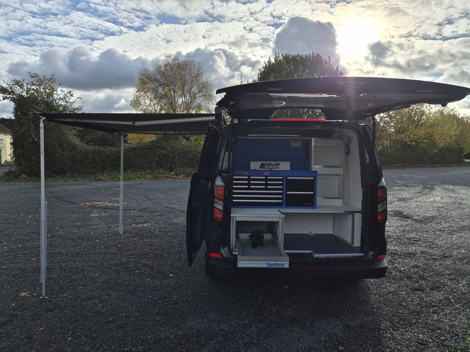 Police Examiner van interior, rear cabinetry and tool storage