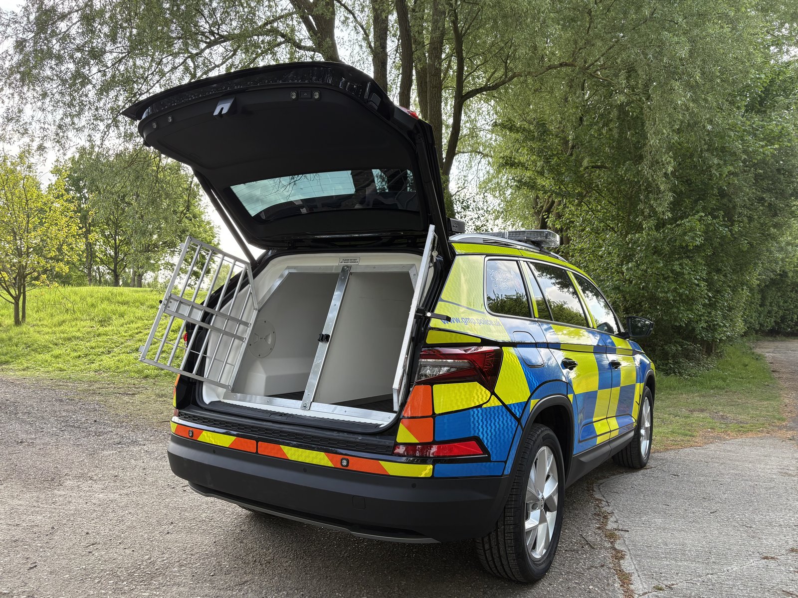 Skoda Kodiaq dog unit, tailgate open showing kennel