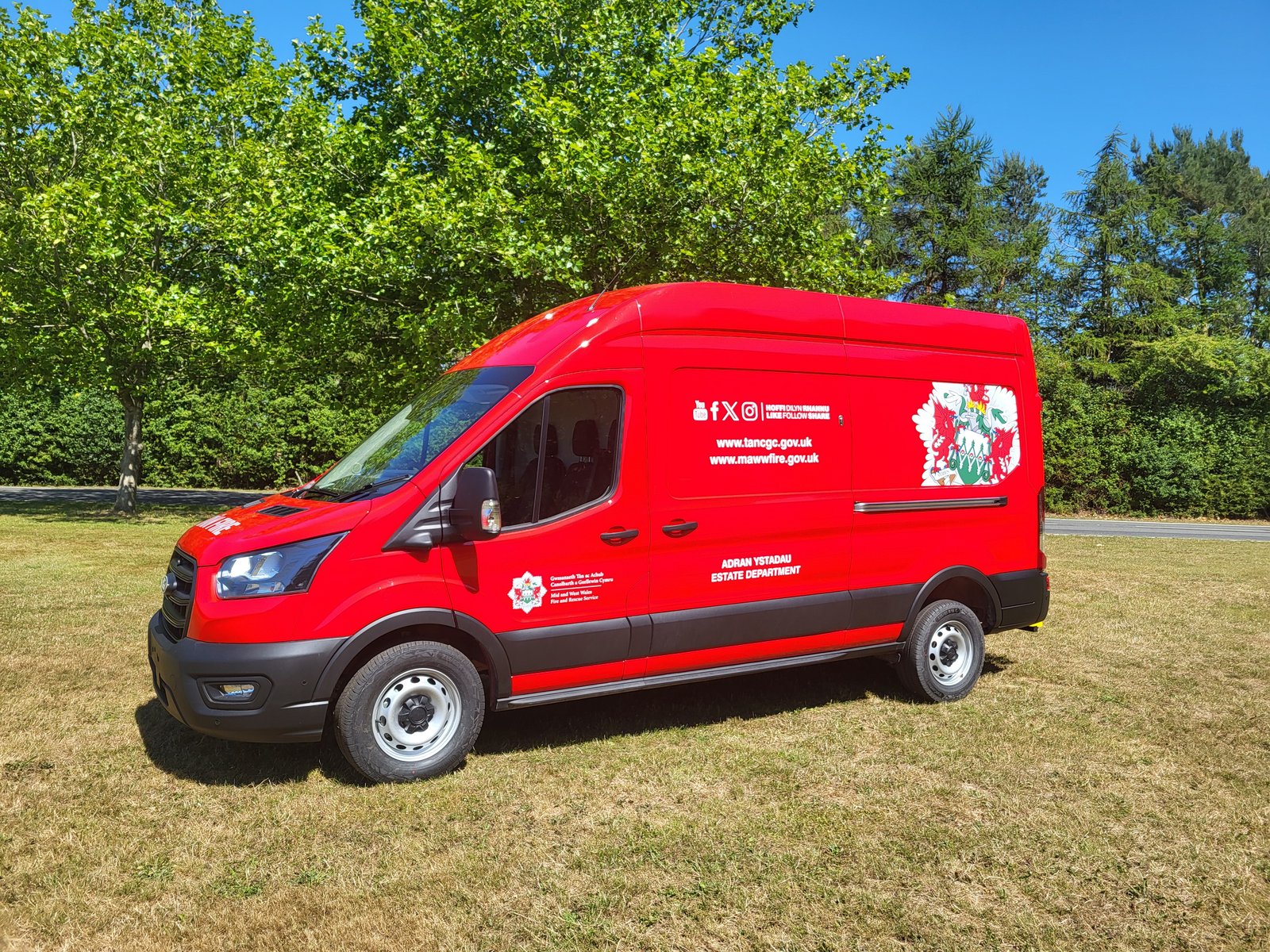 Mid and West Wales Fire and Rescue Service estates van, front three-quarter view