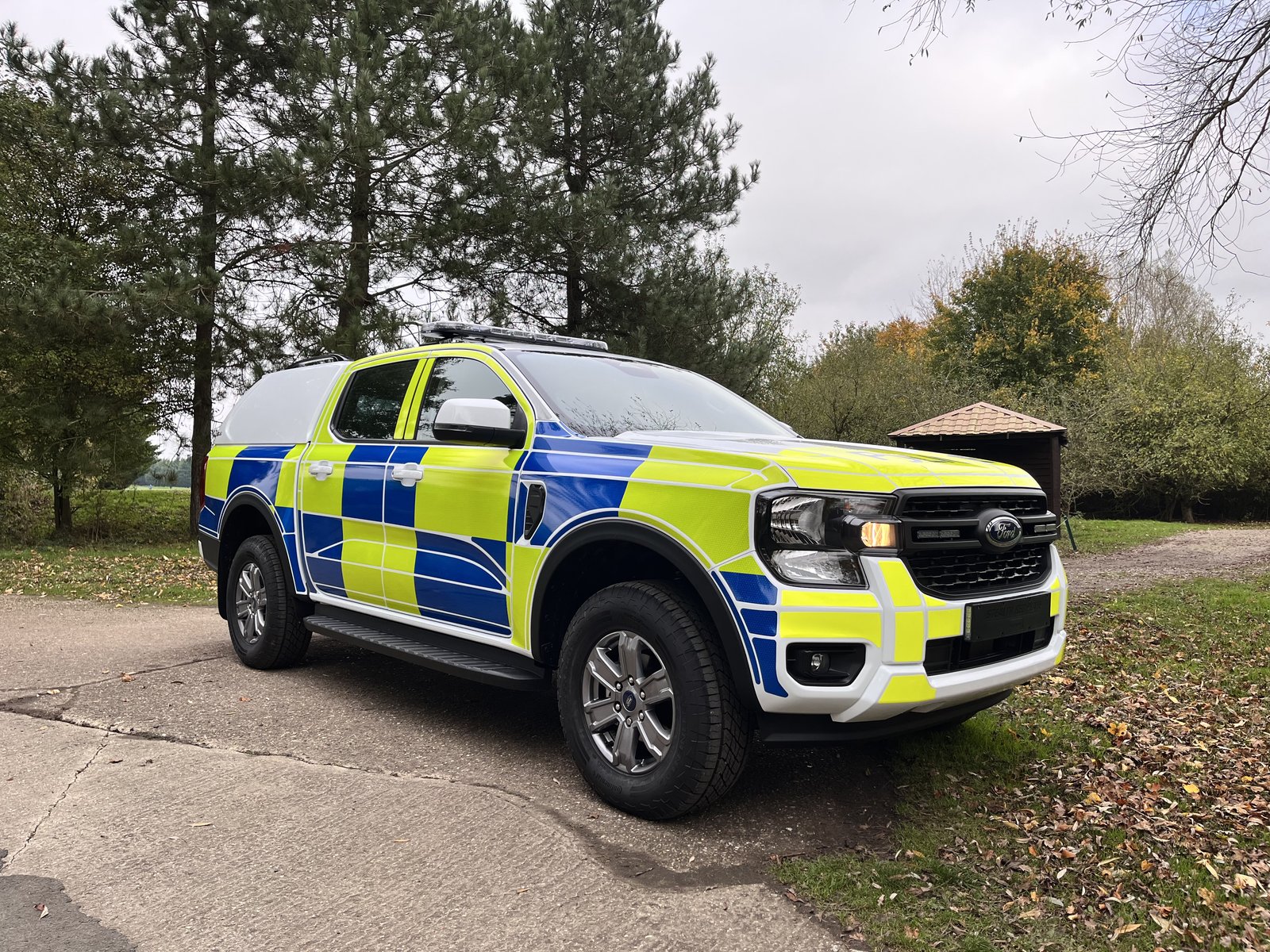 Police Ford Ranger, front three-quarter view parked