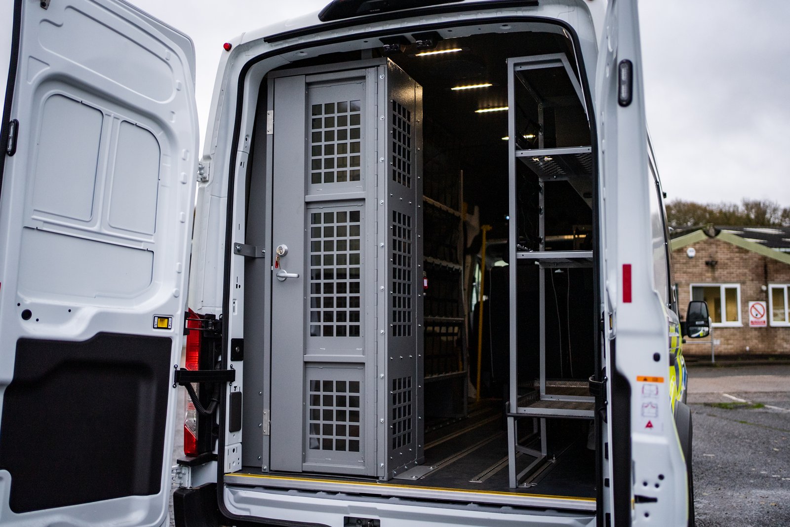 PSU conversion, rear doors open showing secure cage
